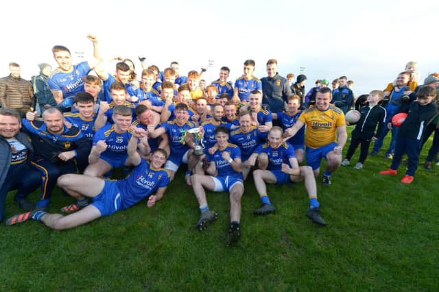 Steelstown players and coaches celebrate defeating Greenlough in the Intermediate Football  Championship Final in Ballymaguigan. (Photo: George Sweeney). DER2144GS – 026