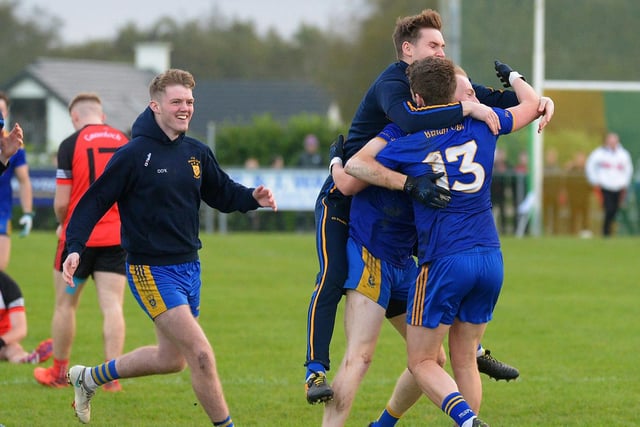 Steelstown players celebrate defeating Greenlough in the Intermediate Football Championship Final in Ballymaguigan on Saturday. (Photo: George Sweeney.) DER2144GS – 033