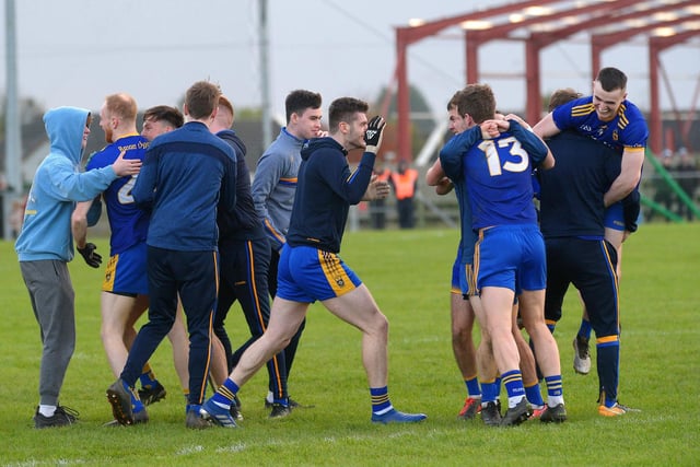 Steelstown players and supporters celebrate defeating Greenlough in the Intermediate Football Championship Final in Ballymaguigan. (Photo: George Sweeney.) DER2144GS – 035