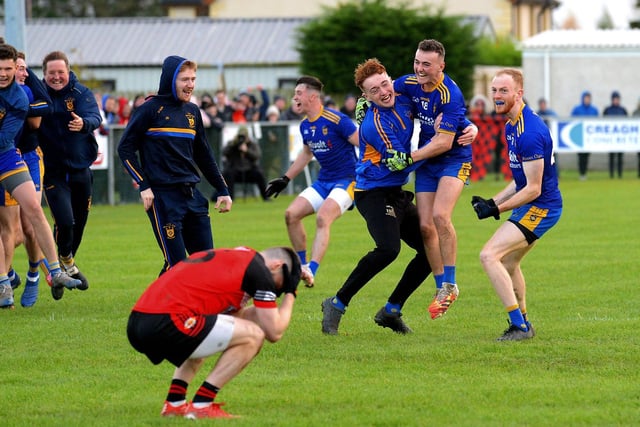 Steelstown players celebrate their victory over Greenlough in the Intermediate Football Championship Final in Ballymaguigan on Saturday. Photo: George Sweeney. DER2144GS – 030
