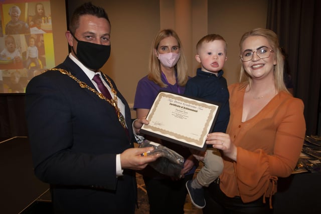 Tiernan Tyre with proud mum Aoife, receiving his certificate and present from the Mayor Graham Warke on Thursday night. (Photos: Jim McCafferty Photography)