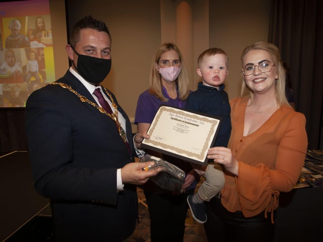 Tiernan Tyre with proud mum Aoife, receiving his certificate and present from the Mayor Graham Warke on Thursday night. (Photos: Jim McCafferty Photography)
