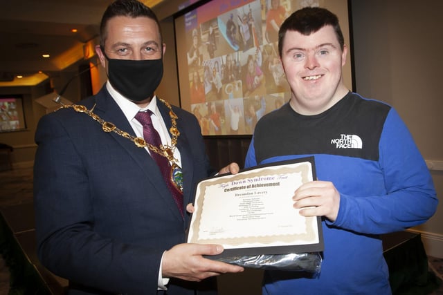 The Mayor presenting Breandan Lavery with his certificate and present at the FDST Celebration of Achievement