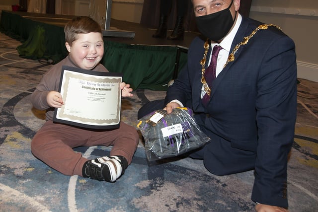 The Mayor Graham Warke presenting Ollie McDermott with his certificate and present at FDST Celebration of Achievement event
