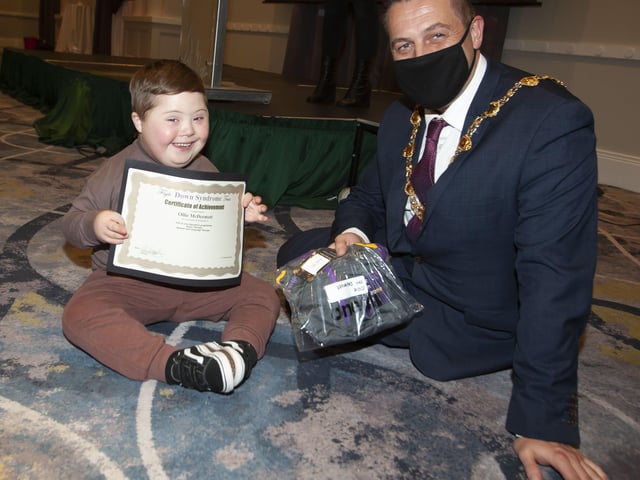 The Mayor Graham Warke presenting Ollie McDermott with his certificate and present at FDST Celebration of Achievement event
