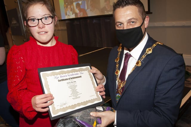 Orla Devlin receiveing her certificate and present from Mayor, Graham Warke at FDST Celebration of Achievement event.