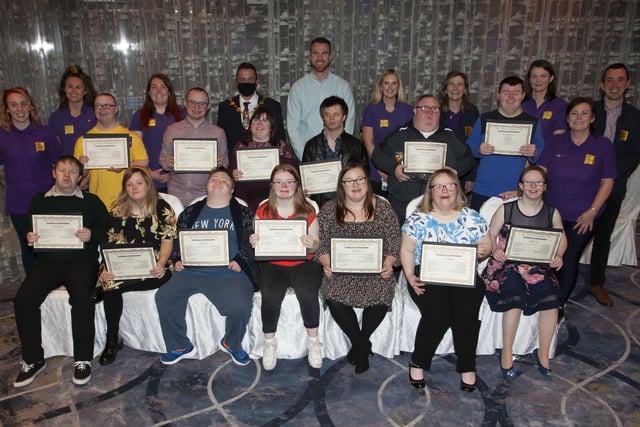 Members of the 20+ year old group proudly displaying their certificates at presents at FDST Celebration of Achievement event at the Everglades Hotel.