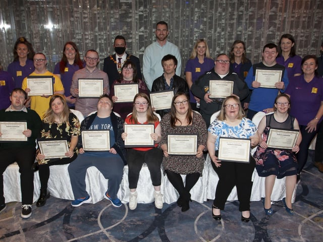 Members of the 20+ year old group proudly displaying their certificates at presents at FDST Celebration of Achievement event at the Everglades Hotel.