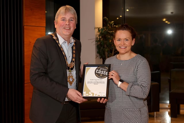 The Mayor of Causeway Coast and Glens Borough Council Councillor Richard Holmes pictured with Great Taste Award winner Lisa Bailey from North Coast Chocolates.