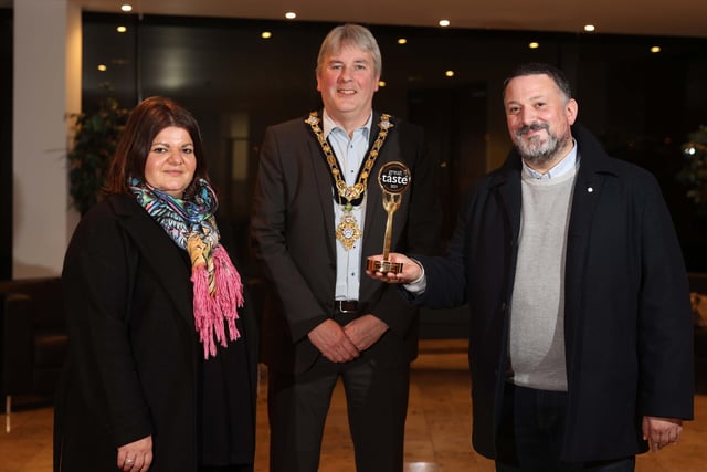 The Mayor of Causeway Coast and Glens Borough Council Councillor Richard Holmes pictured with Great Taste Award winners Daniella and Arnaldo Morelli from Morelli’s ice-cream.