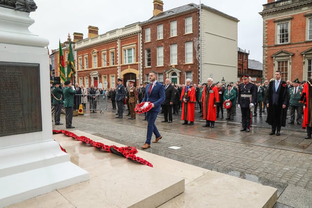 Robbie Butler, deputy leader of the Ulster Unionist Party, lays a wreath at the Cenotaph in Lisburn on Remembrance Sunday