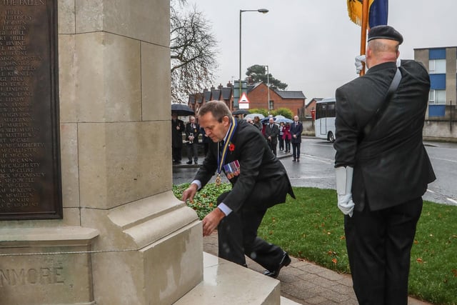 Raymond Corbett President Lisburn Branch Royal British Legion laying a wreath at Hilden War Memorial