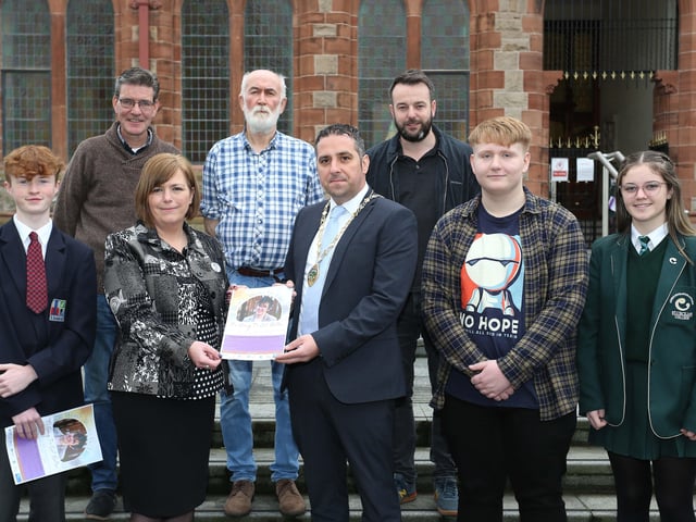 Deputy Mayor Councillor Christopher Jackson  with Nichola McKee Corner launching the event. Included at front, from left, are Morgan O’Hara (Lisneal College), Joel Doherty (Reach Across) and Kelsey McShane (St. Cecilia’s College). Back, from left are Councillor John Boyle, Eamon Baker, Towards Understanding & Healing, co-ordinator, and Colum Eastwood, MP.