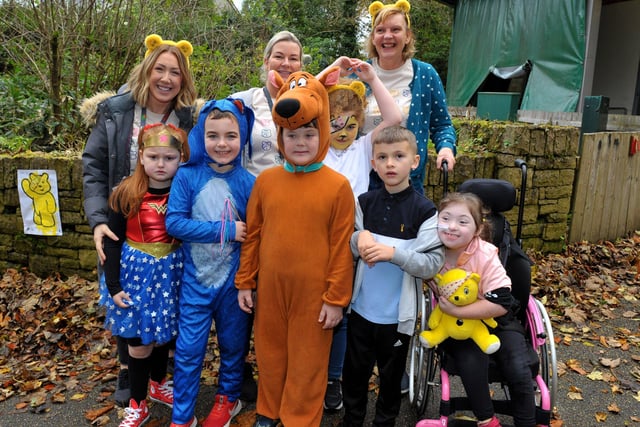Children and staff from Ardnashee School pictured at the ‘Ramble in the Woods’ , at the Playtrail,for Children in Need on Thursday morning last. The event was organised by the pupil’s council. Photo: George Sweeney.  DER2145GS – 077