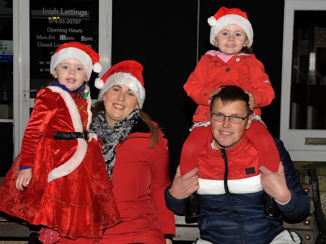 Asha Sakalauskaite, Briggean Sakalanskiene, Ivy and Kestutis Sakalauskes pictured at the switching on of the Christmas tree lights in Buncrana on Friday evening last. Photo: George Sweeney. DER2146GS – 047