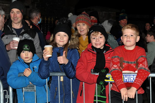 Happy faces at the switching on of the Christmas tree lights in Buncrana on Friday evening last. Photo: George Sweeney.  DER2146GS – 048