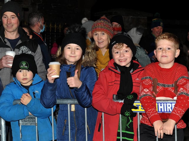 Happy faces at the switching on of the Christmas tree lights in Buncrana on Friday evening last. Photo: George Sweeney. DER2146GS – 048