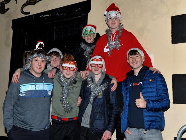 The Curran’s from Buncrana at the switching on of the Christmas tree lights on Friday evening last. Photo: George Sweeney.  DER2146GS – 054