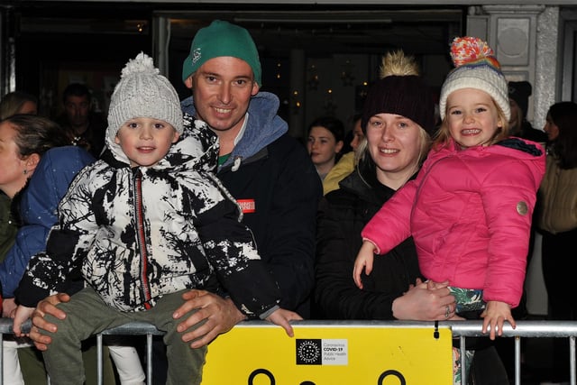 Waiting for Santa to arrive at the switching on of the Christmas tree lights in Buncrana on Friday evening last. Photo: George Sweeney.  DER2146GS – 050