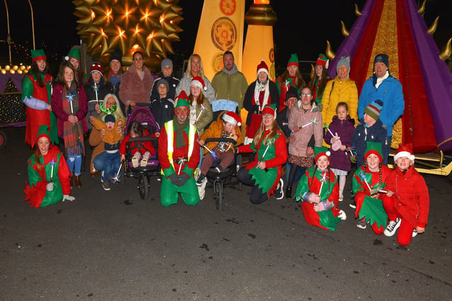 Children and parents from the Foyle Down Syndrome Trust pictured with Santa’s Elves at the Derry Christmas Lights parade on Sunday evening last. Photo: George Sweeney.  DER2147GS – 009