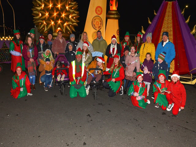 Children and parents from the Foyle Down Syndrome Trust pictured with Santa’s Elves at the Derry Christmas Lights parade on Sunday evening last. Photo: George Sweeney.  DER2147GS – 009