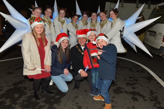 The ‘Stars’ from Studio 2 pictured with Mayor Alderman Graham Warke, Jessica, Caitlin, Ollie and Jamie at the Derry Christmas Lights parade on Sunday evening last. Photo: George Sweeney.  DER2147GS – 011