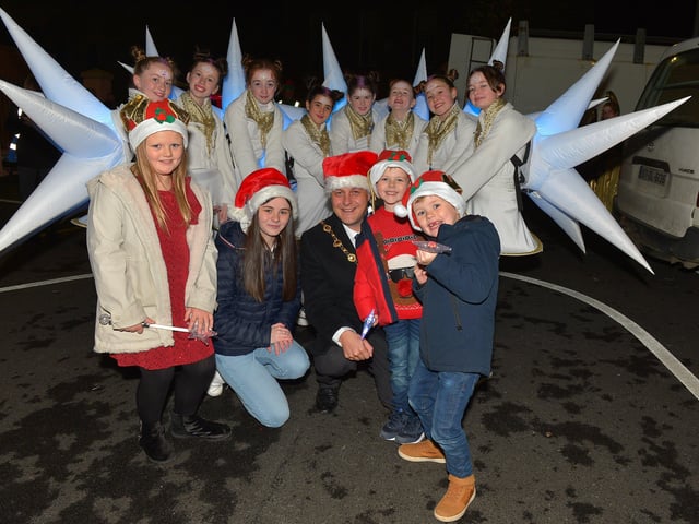 The ‘Stars’ from Studio 2 pictured with Mayor Alderman Graham Warke, Jessica, Caitlin, Ollie and Jamie at the Derry Christmas Lights parade on Sunday evening last. Photo: George Sweeney.  DER2147GS – 011