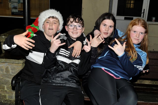 Locals Rhys McGrory, Matthew McDaid, Rebecca McDaid and Leah Doherty were at the switching on of the Christmas tree lights in Buncrana on Friday evening last. Photo: George Sweeney.  DER2146GS – 042