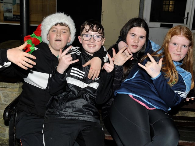 Locals Rhys McGrory, Matthew McDaid, Rebecca McDaid and Leah Doherty were at the switching on of the Christmas tree lights in Buncrana on Friday evening last. Photo: George Sweeney.  DER2146GS – 042