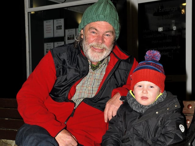 Toby Ward and his granddad George Roddy were at the switching on of the Christmas tree lights in Buncrana on Friday evening last. Photo: George Sweeney.  DER2146GS – 043