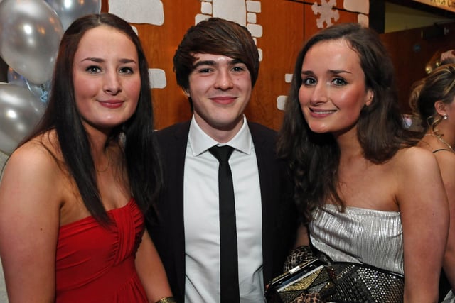 PIctured at Foyle and Londonderry College's annual Formal in the City Hotel are,  Ruth and Molly Babington with Brentt Chambers. Picture Martin McKeown. Inpresspics.com. 26.11.10