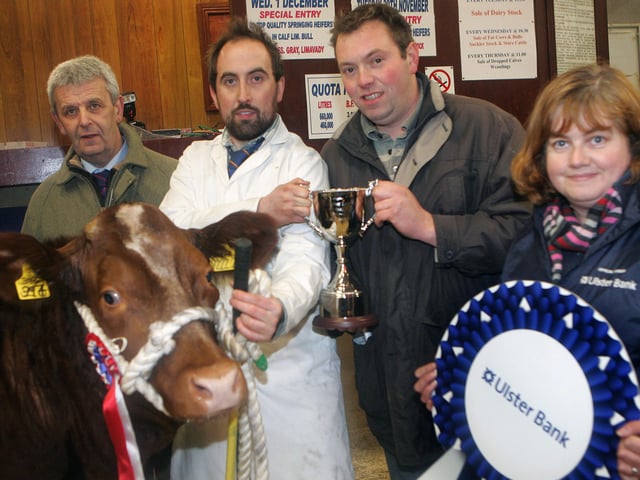 James Alexander receives a cup from James McKay as Ann Calwell looks on with Judge Murray Hardy Picture Steven McAuley/Kevin McAuley Photography Multimedia