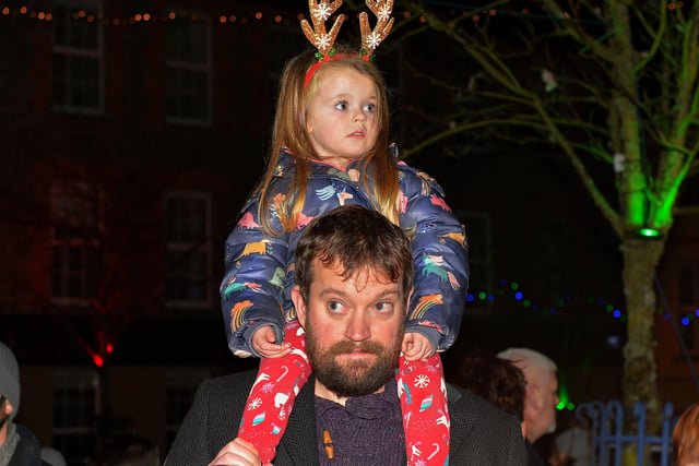 Waiting for Santa at Christmas tree lights witch on in Moville on Sunday evening last. Photo: George Sweeney.  DER2148GS – 010