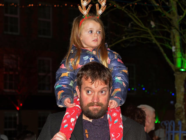 Waiting for Santa at Christmas tree lights witch on in Moville on Sunday evening last. Photo: George Sweeney.  DER2148GS – 010