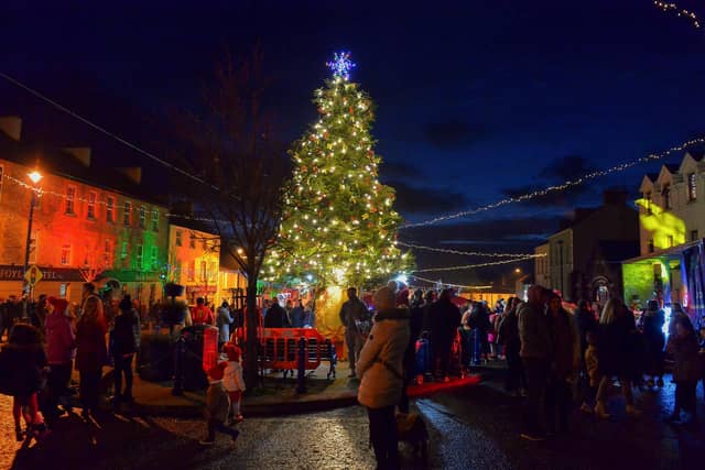 The colourful Christmas tree lights were switched on in Moville on Sunday evening last. Photo: George Sweeney. DER2148GS – 001