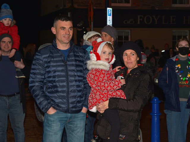 Families gather for the switching on of the Christmas tree lights in Moville on Sunday evening last. Photo: George Sweeney. DER2148GS – 006
