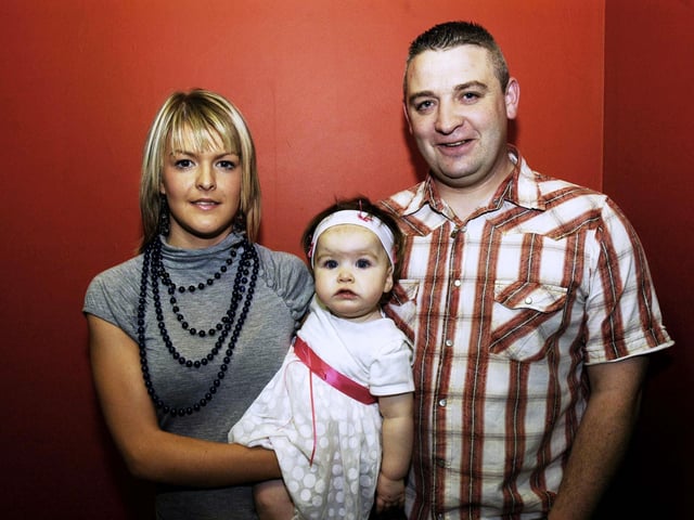 Casey-Leigh Johnston on her 1st birthday with parents Gemma and Hugh.