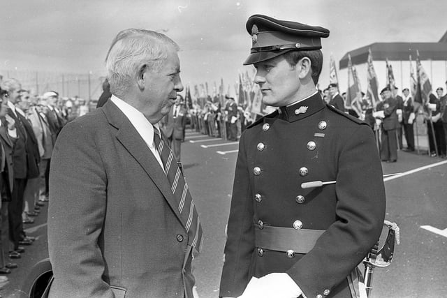 Captain Jack Newton from Dungannon, the Northern Ireland Member of the National Executive, and Mr Stephen Smith, Band Master with the 3rd Battalion Royal Regiment of Fusiliers, discuss the music for the march during the official opening ceremony of the new Bennet House in Portrush in September 1981. Picture: News Letter archives
