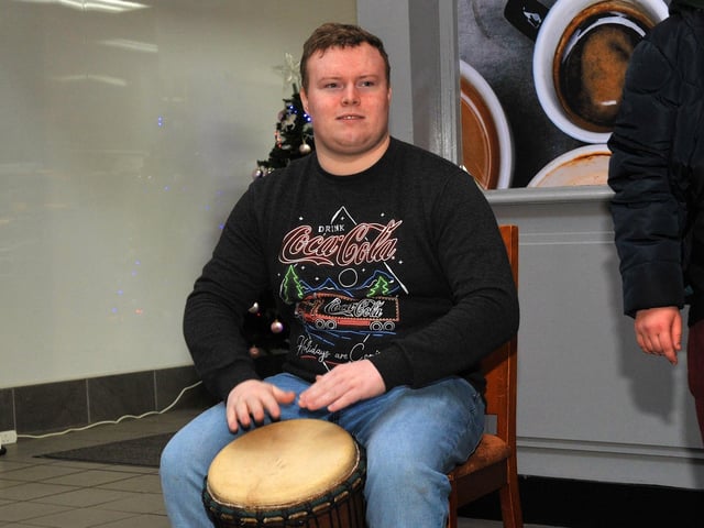 A local percussionist providing the beat for the Calms and HUB choirs at Northside Village Centre, playing the West African djembe drum on Wednesday morning last. DER2148GS – 018
