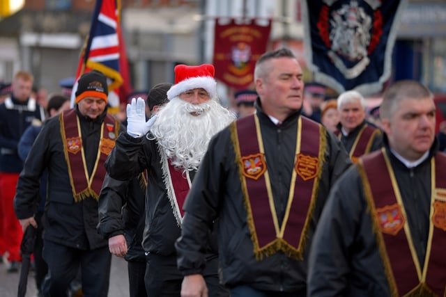 A member of the Belfast Murray Club Belfast wearing a Santa hat and beard during the Apprentice Boys of Derry Annual Shutting of the Gates Parade held in Londonderry on Saturday last. Photo: George Sweeney