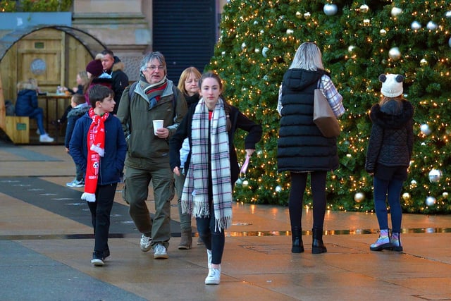 People at the Christmas Market in Guildhall Square on Saturday afternoon last. Photo: George Sweeney.  DER2148GS – 059
