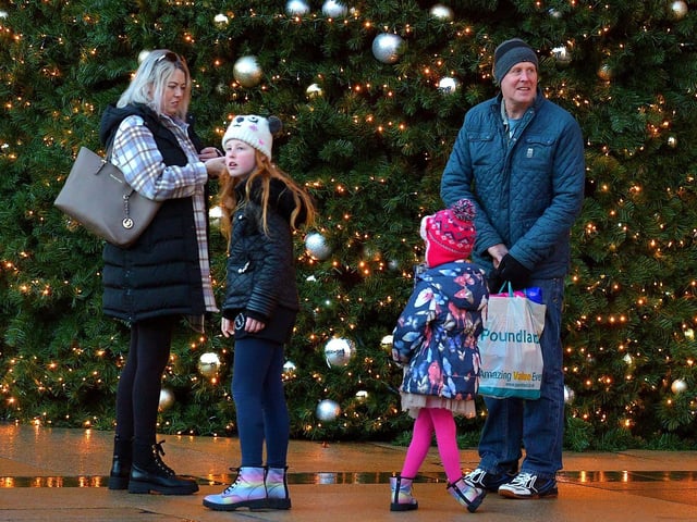 Taking a break from shopping in Guildhall Square on Saturday afternoon last. Photo: George Sweeney. DER2148GS – 060