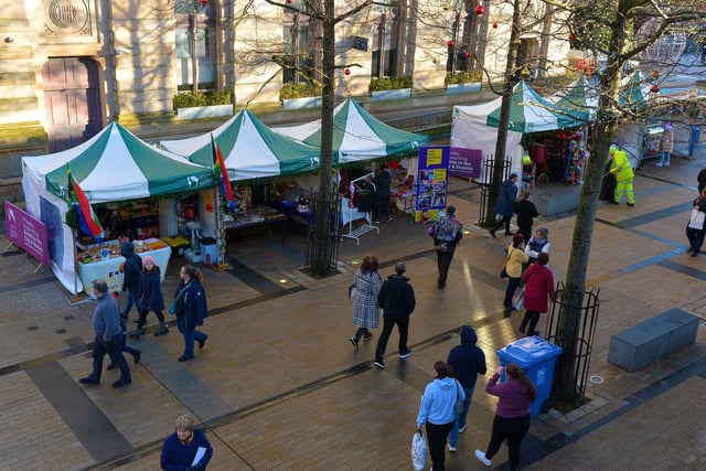 Some of the stalls at the Christmas Market in Guildhall Square on Saturday afternoon last. Photo: George Sweeney.  DER2148GS – 055