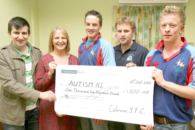 Mark Morrow and Elaine Herald of Autism N.I. North Coast branch are presented with a £1,500 cheque from John Cochrane, treasurer, David Caskey, club leader, and James Taylor, secretary, of Coleraine Young Farmers' Club who rasied the money through a sponsored tractor trek and church service. Pic Kevin McAuley