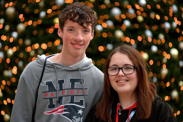Cameron Gillespie and Ellie Dazell.  Ellie said: "My favourite is When Christmas Comes Around. I really like it and was listening to it just yesterday."  Cameron Gillespie said: "I like all the Christmas songs. I have them on every day. I’ve a new playlist made and all." Photo: George Sweeney.  DER2149GS – 032