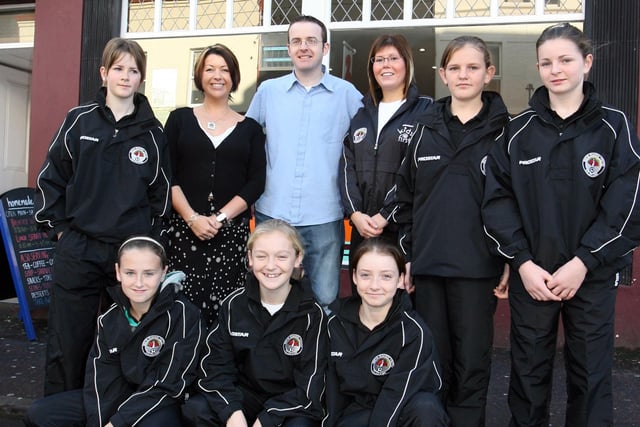 GIRL POWER...Members of Bertie Peacock Youths under 14 girls team who recieved sponsorship from Ingrid and Andrew Boyd of Homemade Cafe in Coleraine for transport to particpate in the Northern Ireland girls league in Dundonald. Homemade located at Railway Road in Coleraine is owned and managed by the brother and sister team, and the girls wish to thank them for thier kind donation. Cr45-119PL