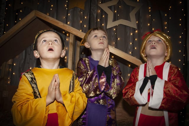 The Three Wise Men look up for guidance in the Long Tower PS Nativity - Kian Mc Keever, Daire Anderson and Charlie Thompson.