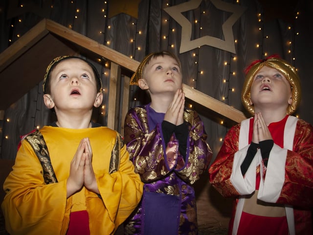 The Three Wise Men look up for guidance in the Long Tower PS Nativity - Kian Mc Keever, Daire Anderson and Charlie Thompson.