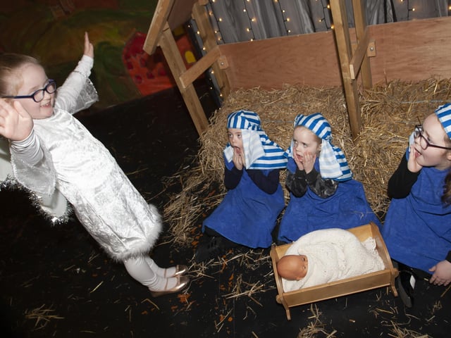 Angel, Amber Wilson gives guidance to shepherds Jace Hillen , Sophia McKinney and Eva Watt. (Photos: Jim McCafferty Photography)