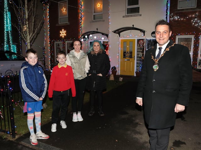 Mayor Graham Warke joins Santa on his sleigh when he visited Christmas Drive, which is lit up for Christmas as a fundraiser for the Foyle Hospice and Hurt charities. Included are Colr. Brian Tierney and Laura Meehan, fundraiser. (Photo - Tom Heaney, nwpresspics)